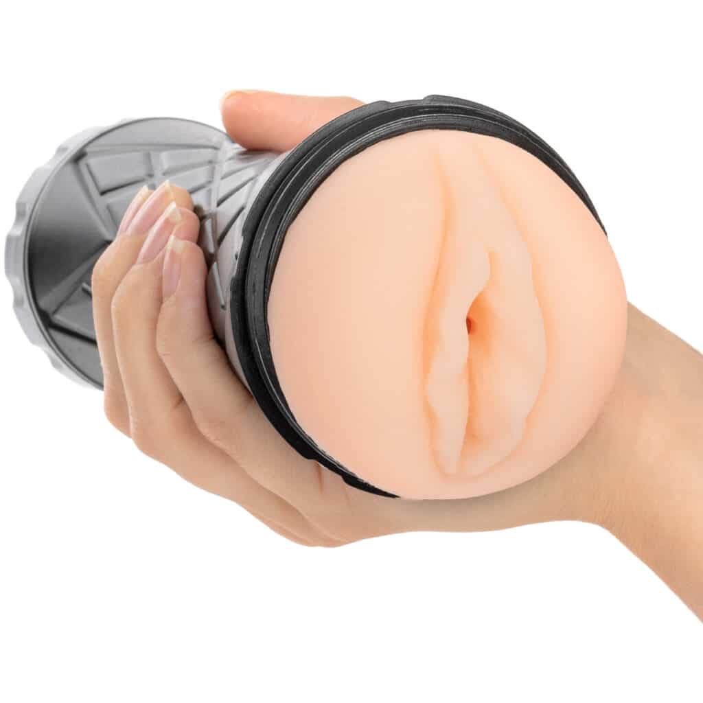 hånd holder i en lommevagina